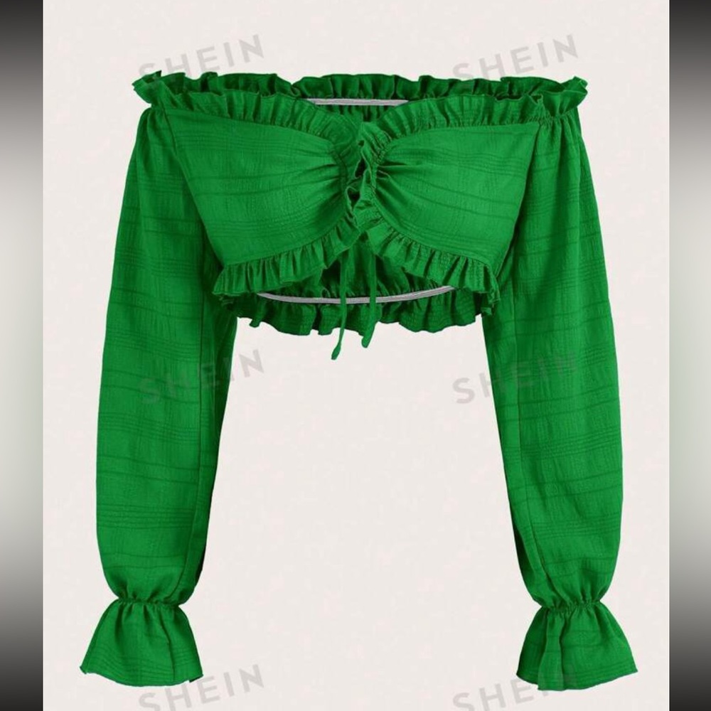 Off shoulder frill trim . Long sleeve crop top